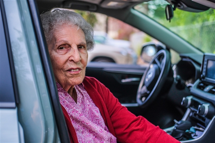 Older adult in a car