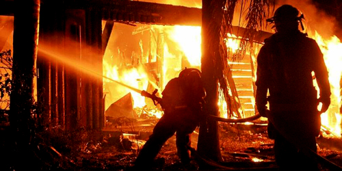 Firefighters puting out fire - 500