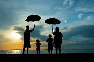 Family with umbrellas
