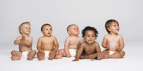 Five babies in diapers
