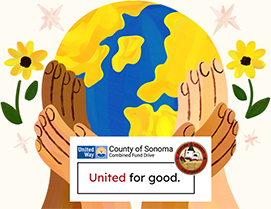 Hands holding a globe with united for good logo