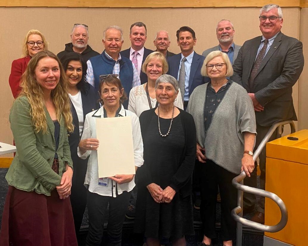 Board of Supervisors posing with members of the Civil Grand Jury