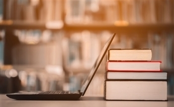 Laptop with Books