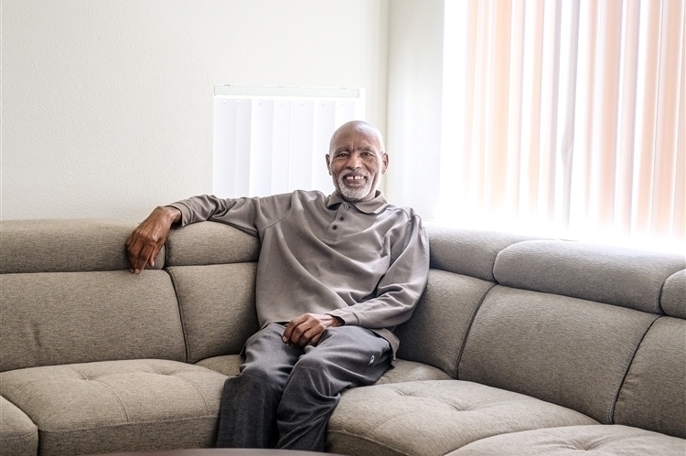 Older Man sitting on couch