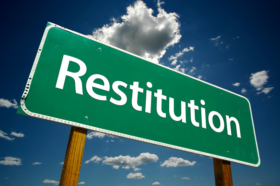 Restitution road sign